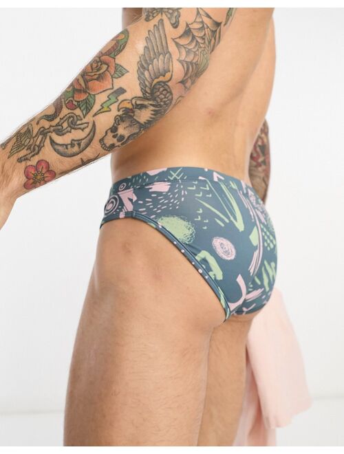 ASOS DESIGN swim trunks in scribble shape print