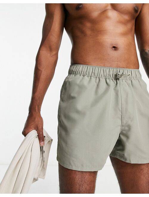 ASOS DESIGN swim shorts in short length with toggle waistband in light khaki