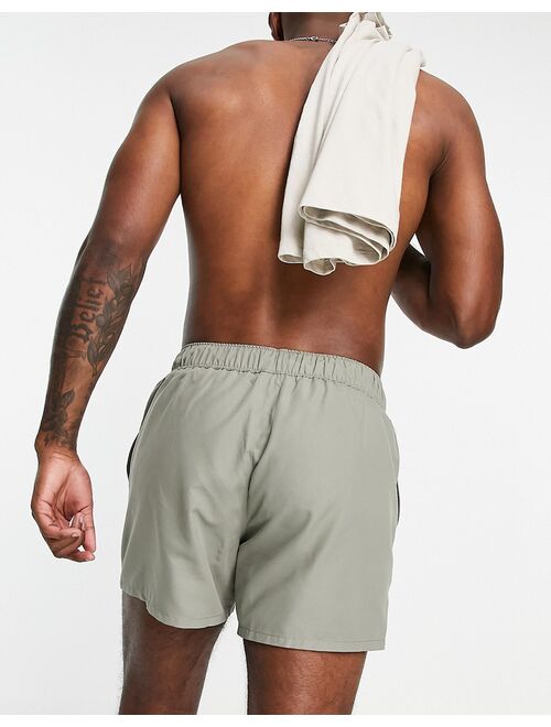 ASOS DESIGN swim shorts in short length with toggle waistband in light khaki