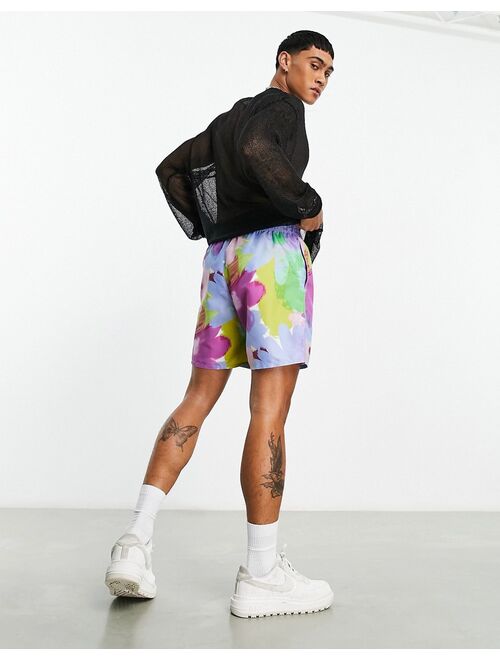 ASOS DESIGN swim shorts in mid length in abstract floral print