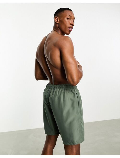 ASOS DESIGN swim shorts in mid length in light green