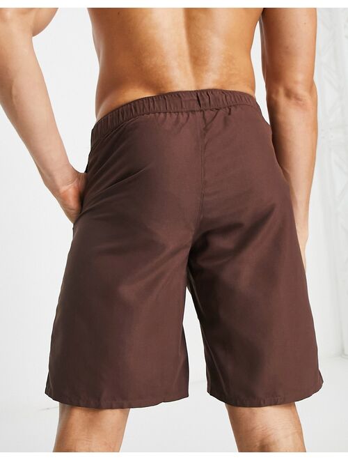 ASOS DESIGN swim shorts in long length in dark brown