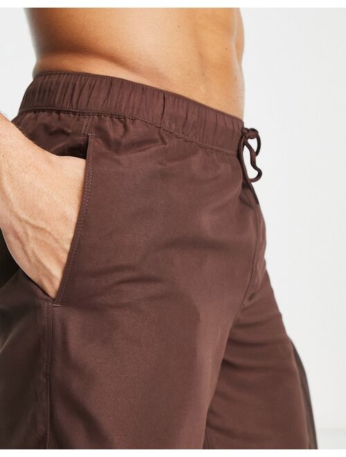 ASOS DESIGN swim shorts in long length in dark brown