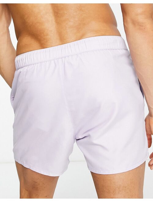 ASOS DESIGN swim shorts in short length in lilac