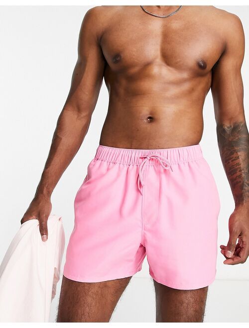 ASOS DESIGN swim shorts in short length in pink