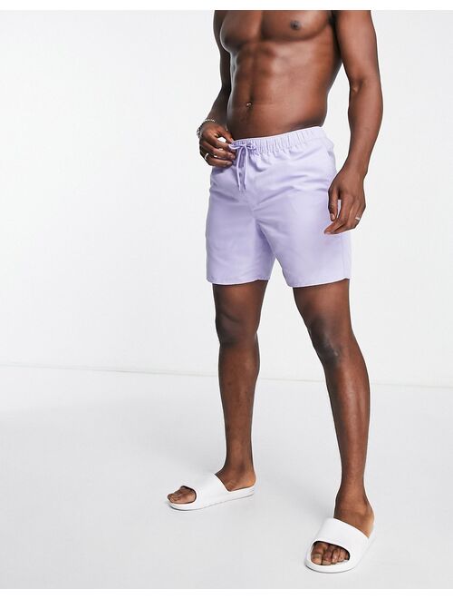 ASOS DESIGN swim shorts in mid length in lilac