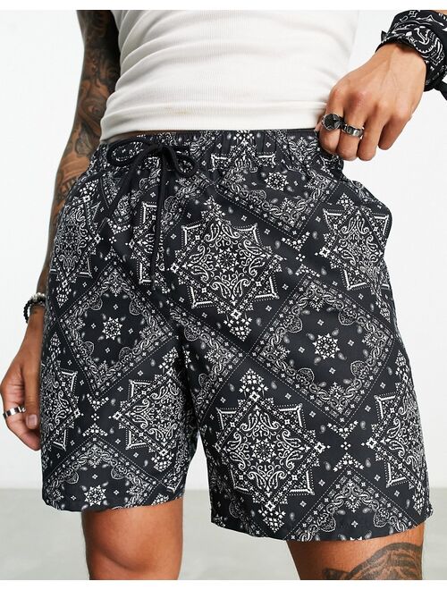 ASOS DESIGN swim shorts in mid length in bandana print