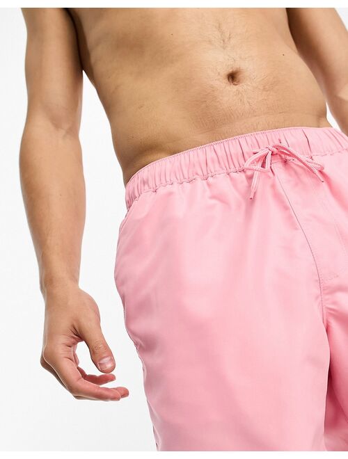 ASOS DESIGN swim shorts in mid length in pink