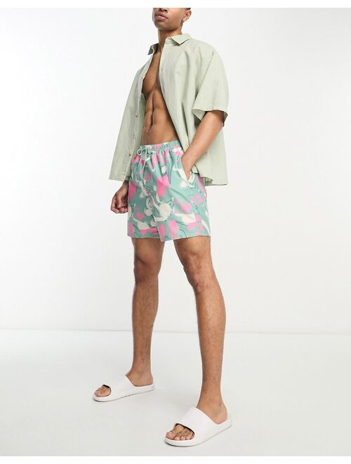 ASOS DESIGN swim shorts in mid length in abstract print