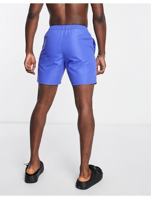 ASOS DESIGN swim shorts mid length in blue