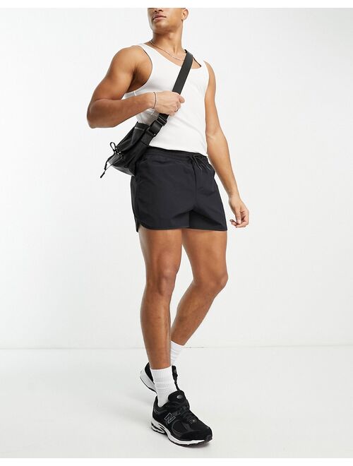 Weekday Tan Structure swim shorts in black