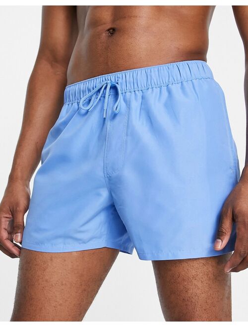 ASOS DESIGN swim shorts in short length in blue