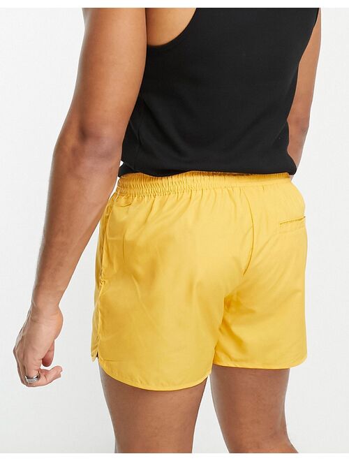 Weekday Tan swim shorts in yellow