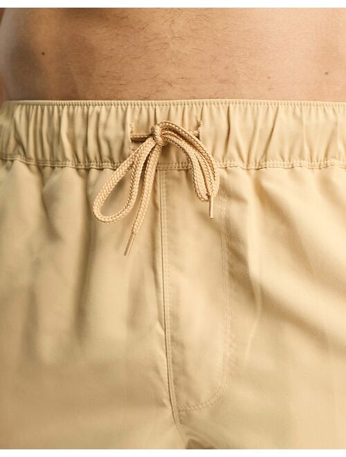 ASOS DESIGN swim shorts in long length in light khaki