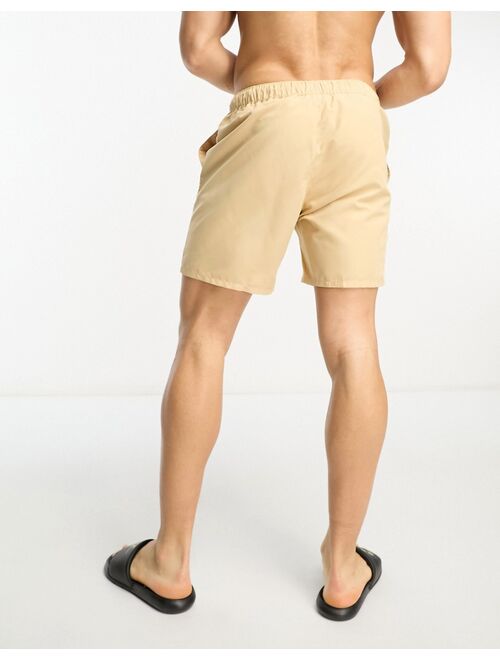 ASOS DESIGN swim shorts in long length in light khaki