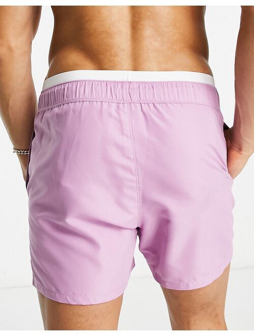 ASOS DESIGN swim shorts in short length with double waistband in lilac