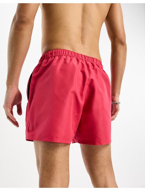 ASOS DESIGN swim shorts in short length in pink