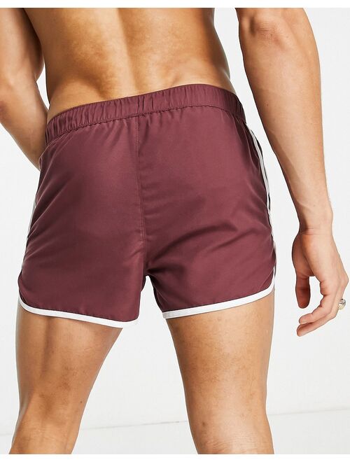 ASOS DESIGN runner swim shorts in super short length with white binding in burgundy