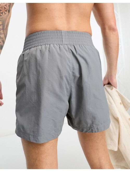 ASOS DESIGN swim shorts in short length with thick waistband in charcoal