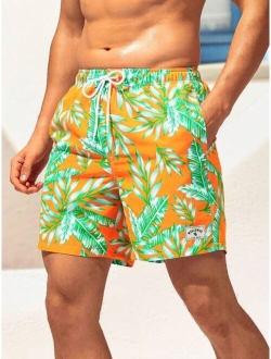 Men Tropical Print Letter Patched Detail Drawstring Waist Swim Trunks