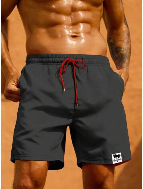 Men Letter Patched Drawstring Waist Swim Trunks