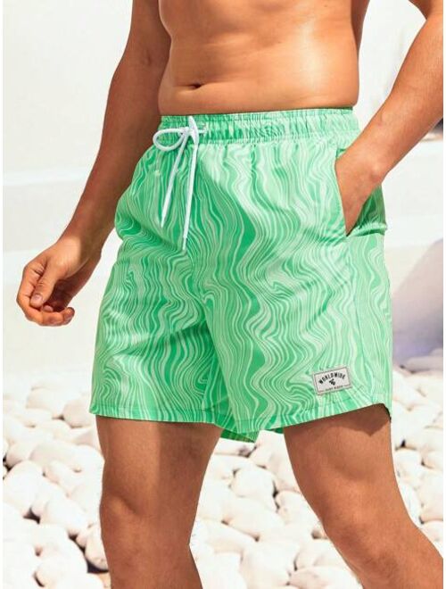 SHEIN X Hangout Fest Men Wave Striped Patched Detail Drawstring Waist Swim Trunks