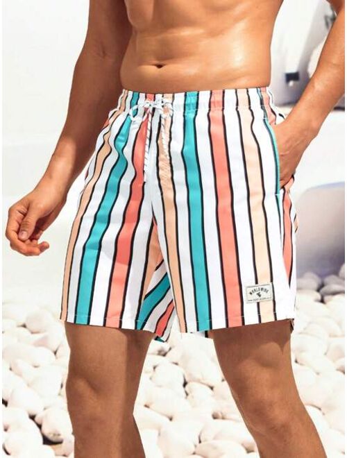 Men Colorblock Striped Letter Patched Drawstring Waist Swim Trunks