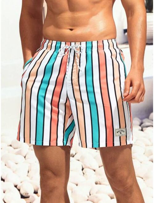 Men Colorblock Striped Letter Patched Drawstring Waist Swim Trunks