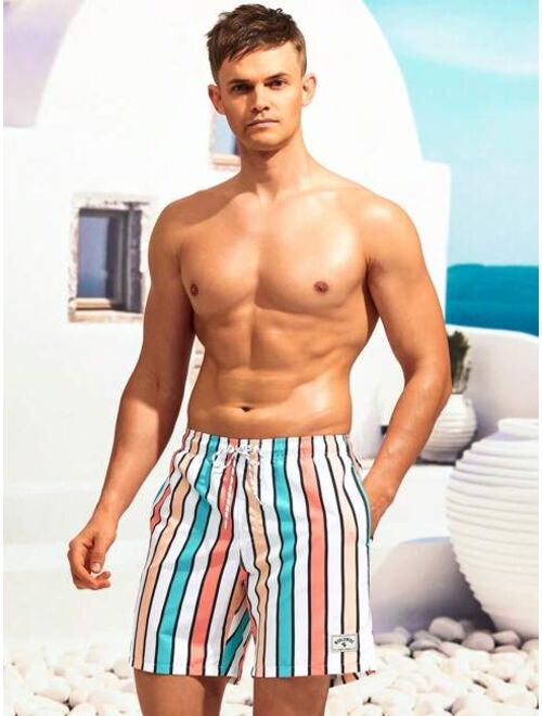 Men Colorblock Striped Letter Patched Drawstring Waist Swim Trunks