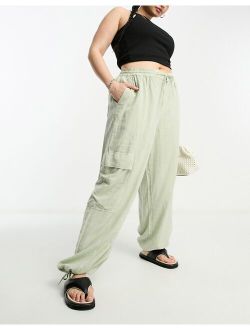 ASOS Curve ASOS DESIGN Curve linen pull on cargo pants in sage