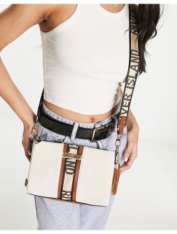 canvas logo cross body bag in beige