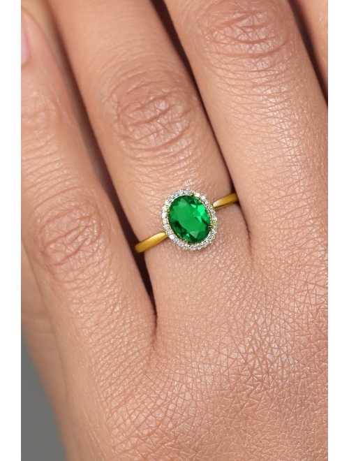 Gem Stone King 10K Yellow Gold Green Simulated Emerald and Diamond Engagement Ring For Women (1.00 Cttw, Oval 8X6MM, Available In Size 5,6,7,8,9)