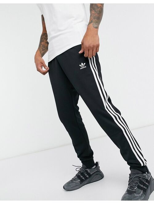 adidas Originals adicolor three stripe skinny sweatpants in black