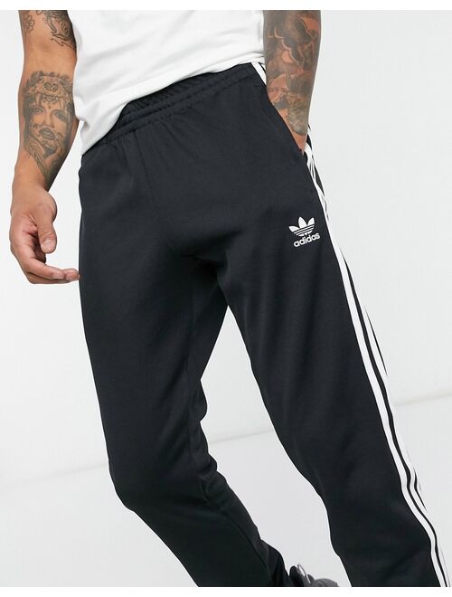 adidas Originals adicolor three stripe skinny sweatpants in black