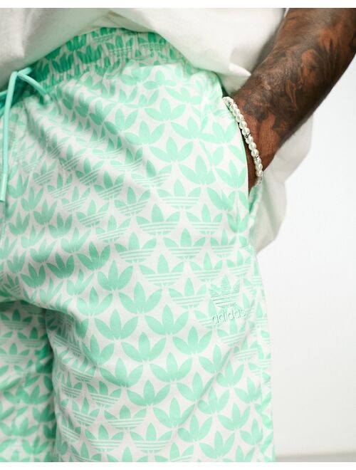 adidas Originals Monogram AOP shorts in green