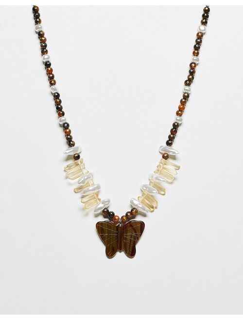 Reclaimed Vintage unisex boho beaded necklace with butterfly