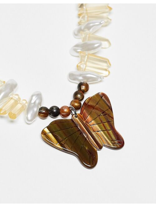 Reclaimed Vintage unisex boho beaded necklace with butterfly