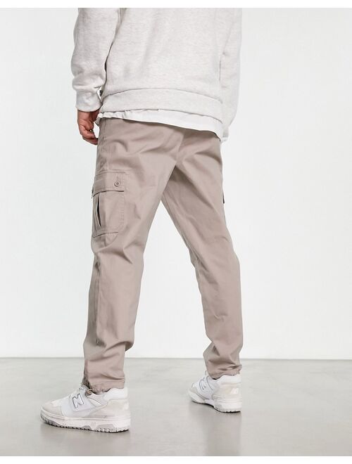 ASOS DESIGN tapered cargo pants in brown