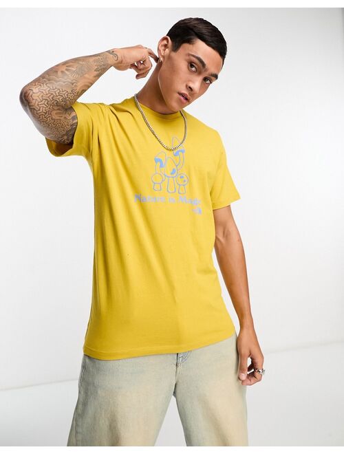 The North Face 'Nature is Magic' chest print t-shirt in yellow