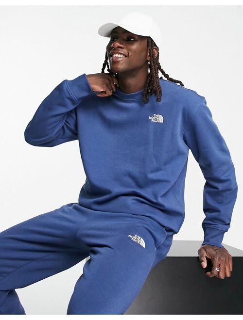 The North Face Essentials sweatshirt in dark blue - Exclusive at ASOS