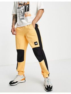 Phlego track sweatpants in orange