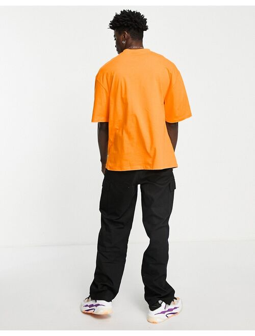 COLLUSION oversized logo t-shirt in orange