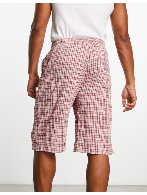 COLLUSION festival textured baggy skater short in pink plaid