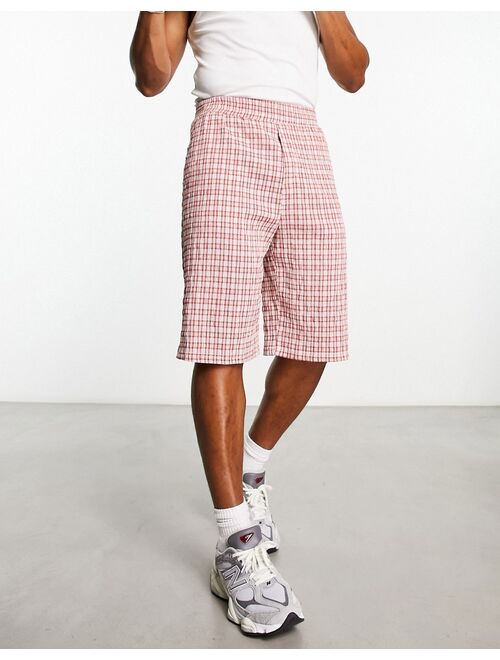 COLLUSION festival textured baggy skater short in pink plaid