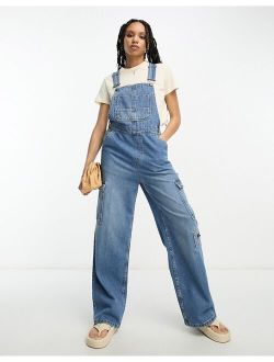 denim cargo overalls in mid blue