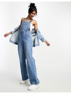 ASOS DESIGN denim cargo overalls in mid blue