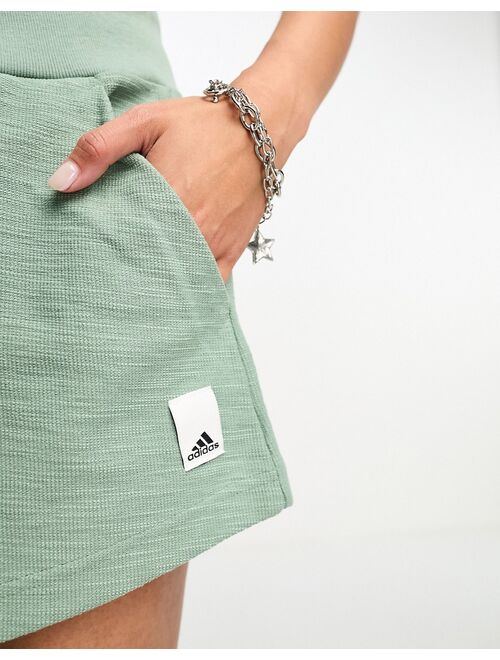 adidas performance adidas Lounge long shorts in green