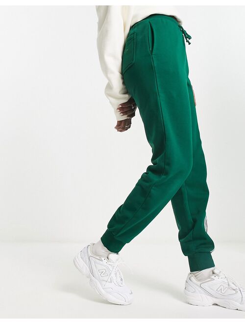 adidas Originals varisty logo sweatpants in green