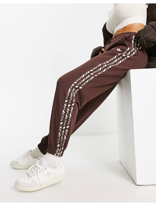 adidas Originals Animal Abstract sweatpants in brown