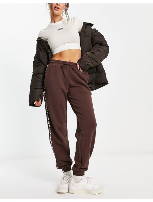 adidas Originals Animal Abstract sweatpants in brown